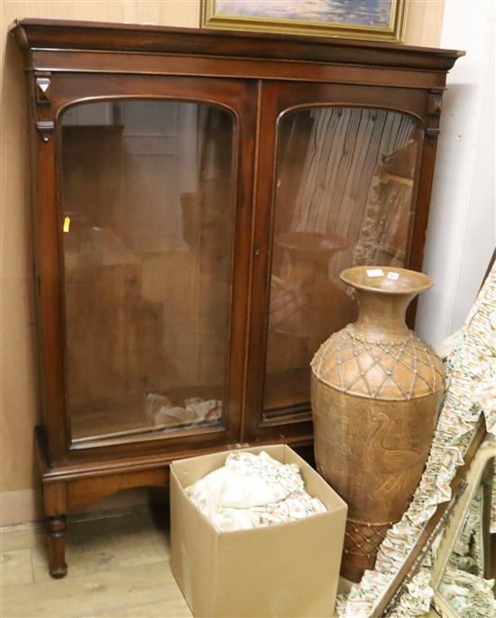 A Victorian mahogany bookcase cabinet on stand, W.138cm